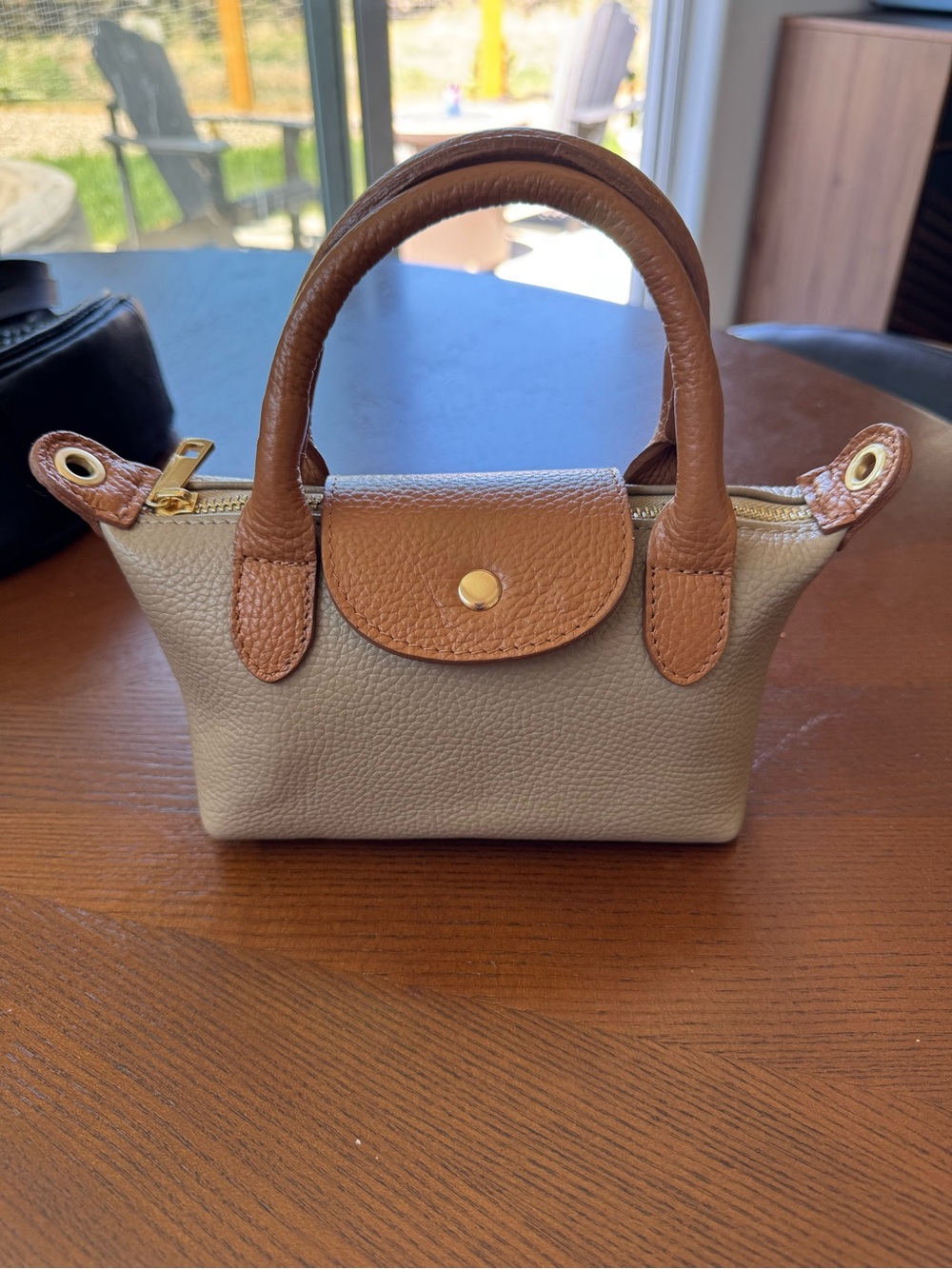Leather, bought in Barcelona.  Two-Tone Mini Crossbody Tote - Cream and Brown